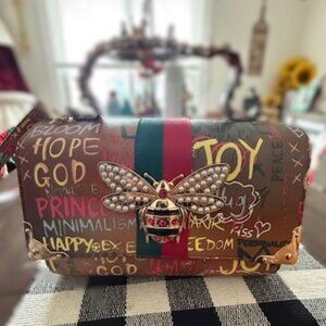 Alba Brown Graffiti Crossbody Bag with Bee Accent